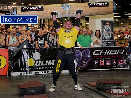 Krzysztof Radzikowski breaks the giant log lift record at the second stage of the MHP Strongman Champions with 206kg. The traditional log has a diameter of 32cm and the giant log has a 36cm diameter and is 3 meters long. IronMind® | Photo by Aryn Lockhart/Strongman Rage