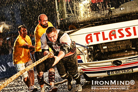 Ilkka Kinnunen: &ldquo;Here is a great shot of the Bus Pull in Romania. As you can see it was raining like hell, but we all survived and the IronMind harness did the job :-).&rdquo; IronMind&reg; | &copy;Silvana Armat, courtesy of SCL 