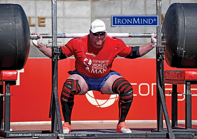 jean francois caron wsm 2017 squat Jean-Francois Caron (Canada) was second only to Eddie Hall in the squat at the 2017 World’s Strongest Man contest (Gaborone, Botswana), where he finished fifth place overall and proved once again that he can give up a lot of bodyweight and still be fiercely competitive on the professional strongman circuit. IronMind® | ©Randall J. Strossen photo