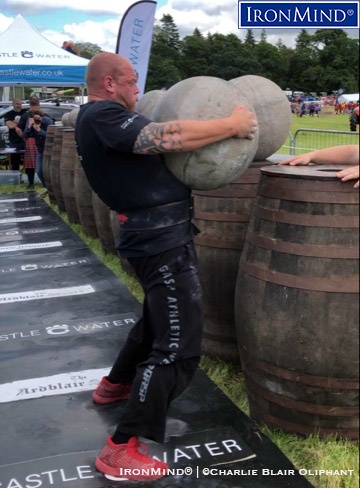 Paul Benton IHGF Stones of Strength Paul Benton on his way to breaking the world record for loading the Ardblair stones at the IHGF Stones of Strength competition held at the Fettercairn Show (Fettercairn, Scotland). IronMind® | Photo courtesy of Charlie Blair Oliphant