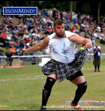 Facing a tough field, Skylar Arneson (USA) held on for the victory at the 2019 IHGF World Amateur Highland Games Championships in Bressuire, France. IronMind® | Photo courtesy of Henrietta Borbely