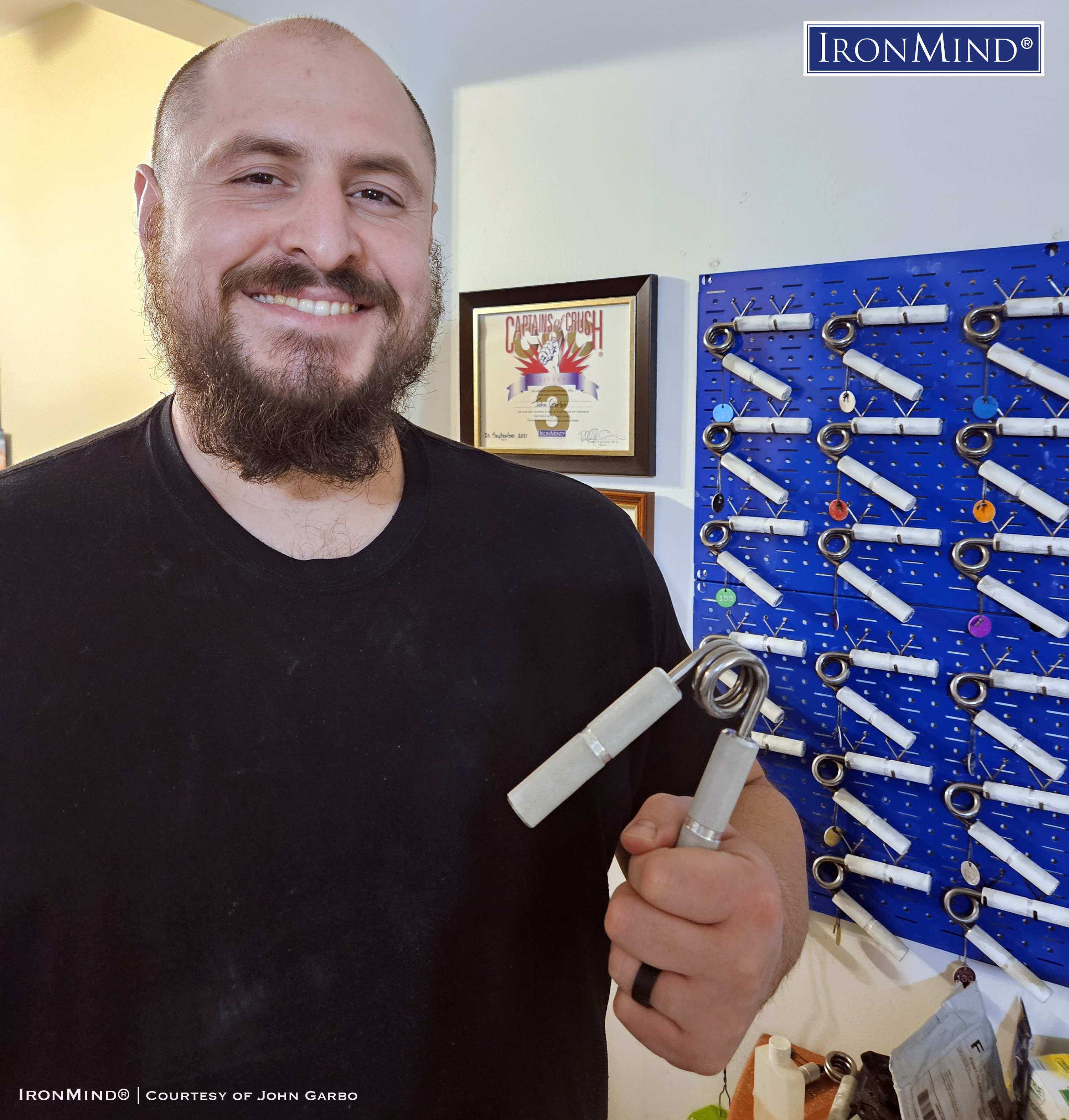 John Garbo, a 35-year old police officer in Ohio, has been certified on the Crushed-To-Dust! Challenge—proving his outstanding all-around grip strength. John is 6’ 1” tall and weighs 310 lb. IronMind® | Courtesy of John Garbo