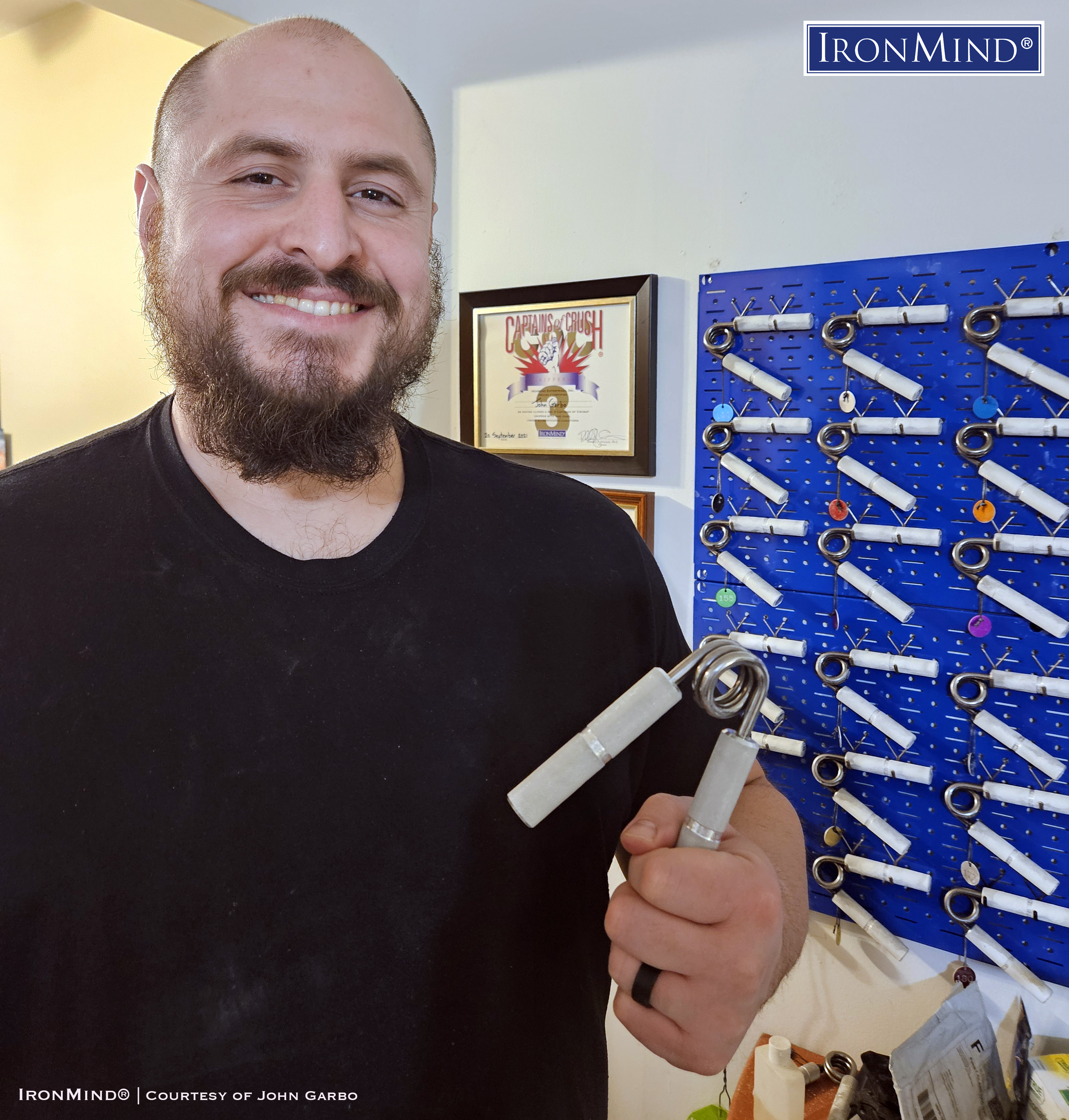 John Garbo IronMind Crushed To Dust Certification John Garbo, a 35-year old police officer in Ohio, has been certified on the Crushed-To-Dust! Challenge—proving his outstanding all-around grip strength. John is 6’ 1” tall and weighs 310 lb. IronMind® | Courtesy of John Garbo