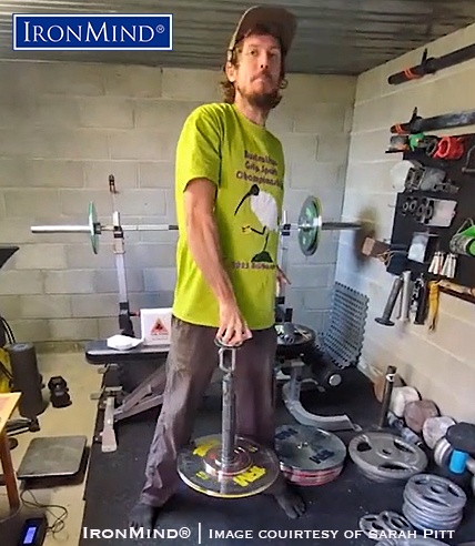 Tasmanian grip guy Isaac Pitt lifting 20 kg on the IronMind Hub, one of three elements in the Crushed-To-Dust® Challenge—the universal measure of excellent all-around grip strength. Isaac is 36 years old, weighs about 80 kg/175 lb. And is 190 cm/6’ 3” tall. ©IronMind Enterprises, Inc. | Image courtesy of Sarah Pitt