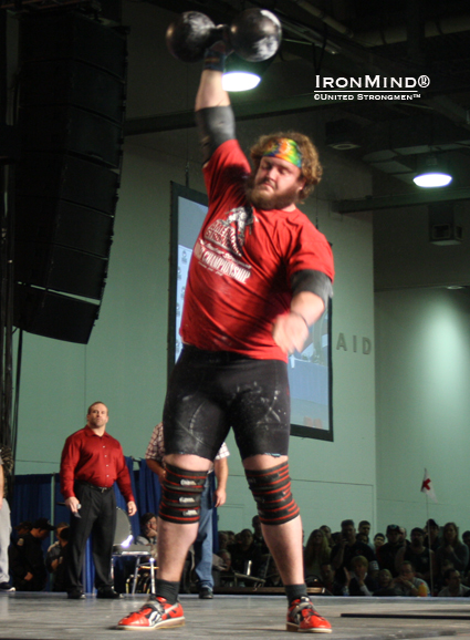 "Adam Scherr during the DB medley in today's finals . . .  The champion deserves a photo due he seemed to be a great showman personality with an [appeareance] between young Bill Kazmaier and Doyle Kenady :)," Jyrki Rantanen reported to IronMind.  IronMind® | Courtesy of United Strongmen™.