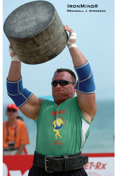 Jarek Dymek, shown on the overhead stone lift at the 2006 World’s Strongest Man contest, has just joined the field for SCL-London.  IronMind® | Randall J. Strossen photo.