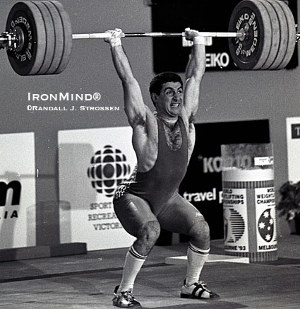 Pounding out a 222.5 clean and jerk at the 1993 World Weightlifting Championships, Kakhi Kakhiashvili displays his trademark power jerk.  IronMind® | Randall J. Strossen photo.