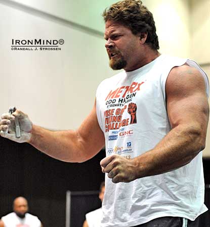 Among his performances in the grip contest at the LA FitExpo, Mike Burke broke the CoC Silver Bullet Hold world record—keeping a CoC No. 3 gripper clamped on the Silver Bullet for a world record 53.97 seconds before his hand opened up.  Imagine doing that and then succeeding on his official attempt to close the Captains of Crush No. 3.5 gripper?  That’s exactly what Mike Burke did and now he's the latest guy to certify on the CoC No. 3.5.  IronMind® | Randall J. Strossen photo. 