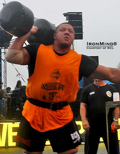 Misha Koklyaev won the Giant Dumbbell for reps, with two reps on this 120-kg dumbbell—believed to be the heaviest ever used in a strongman contest, Ilkka Kinnunen told IronMind®.  IronMind® | Photo courtesy of SCL.