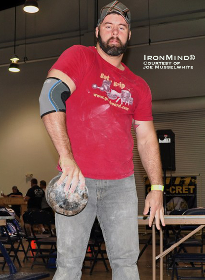 Paul Knight lofts the Blob, showing that his thumb strength is right in there with his other four fingers.  Knight has just re-certified on the No. 3 Captains of Crush (CoC) Gripper.  IronMind® | Photo courtesy of Joe Musselwhite.