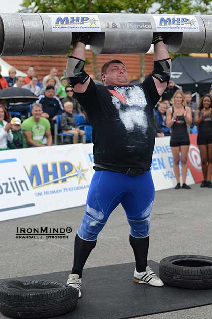 Zydrunas Savickas opened his 2012 strongman season with a world record attempt in the Log Lift at the MHP Strongman Champions League–Holland and you can see how close he came to succeeding with the 221-kg lift.  IronMind® | Randall J. Strossen photo.